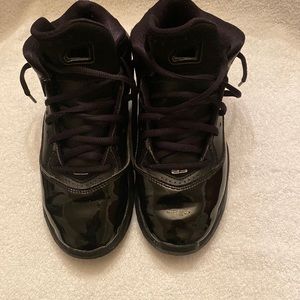 Nike Air Jordans. Black Patent Leather
